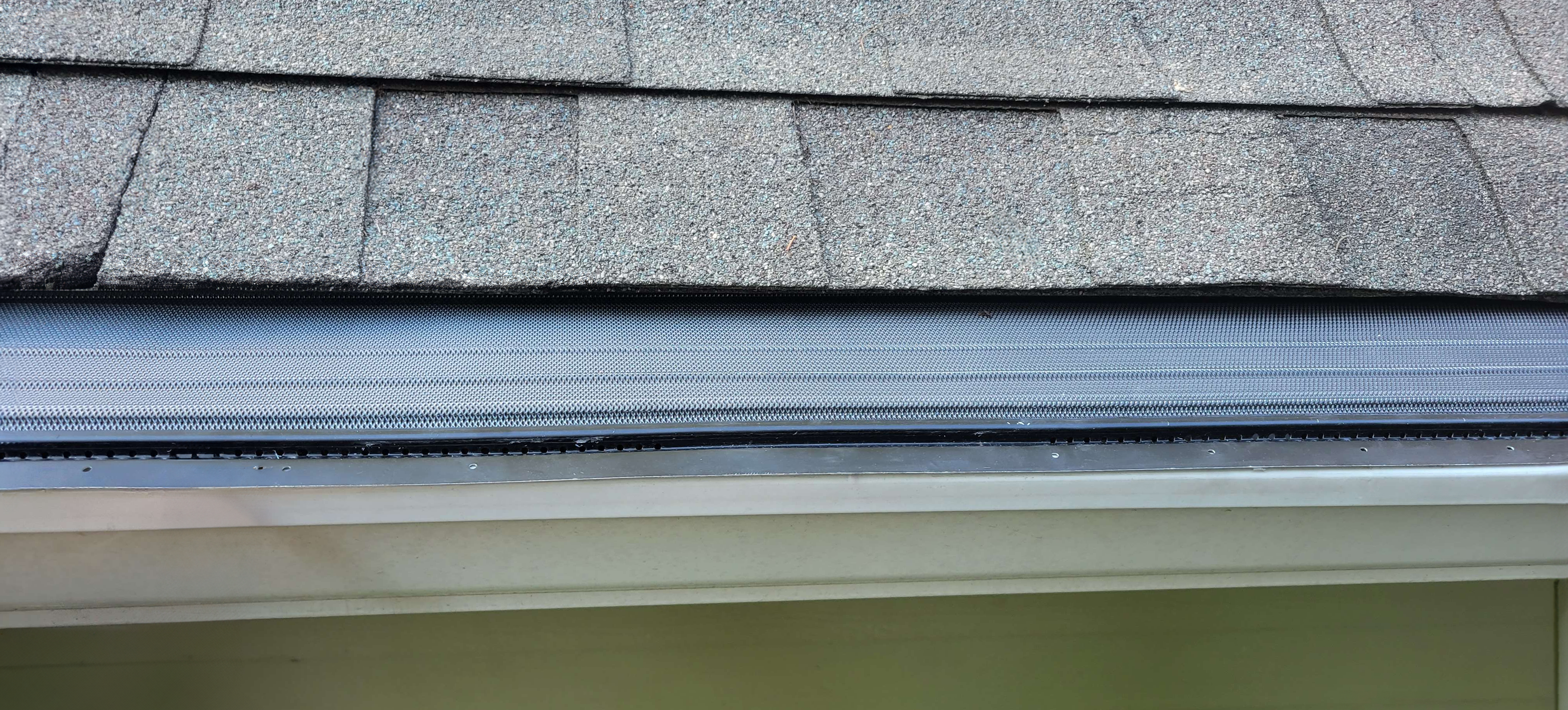 Professional installation of Active Mesh aluminum on residential home